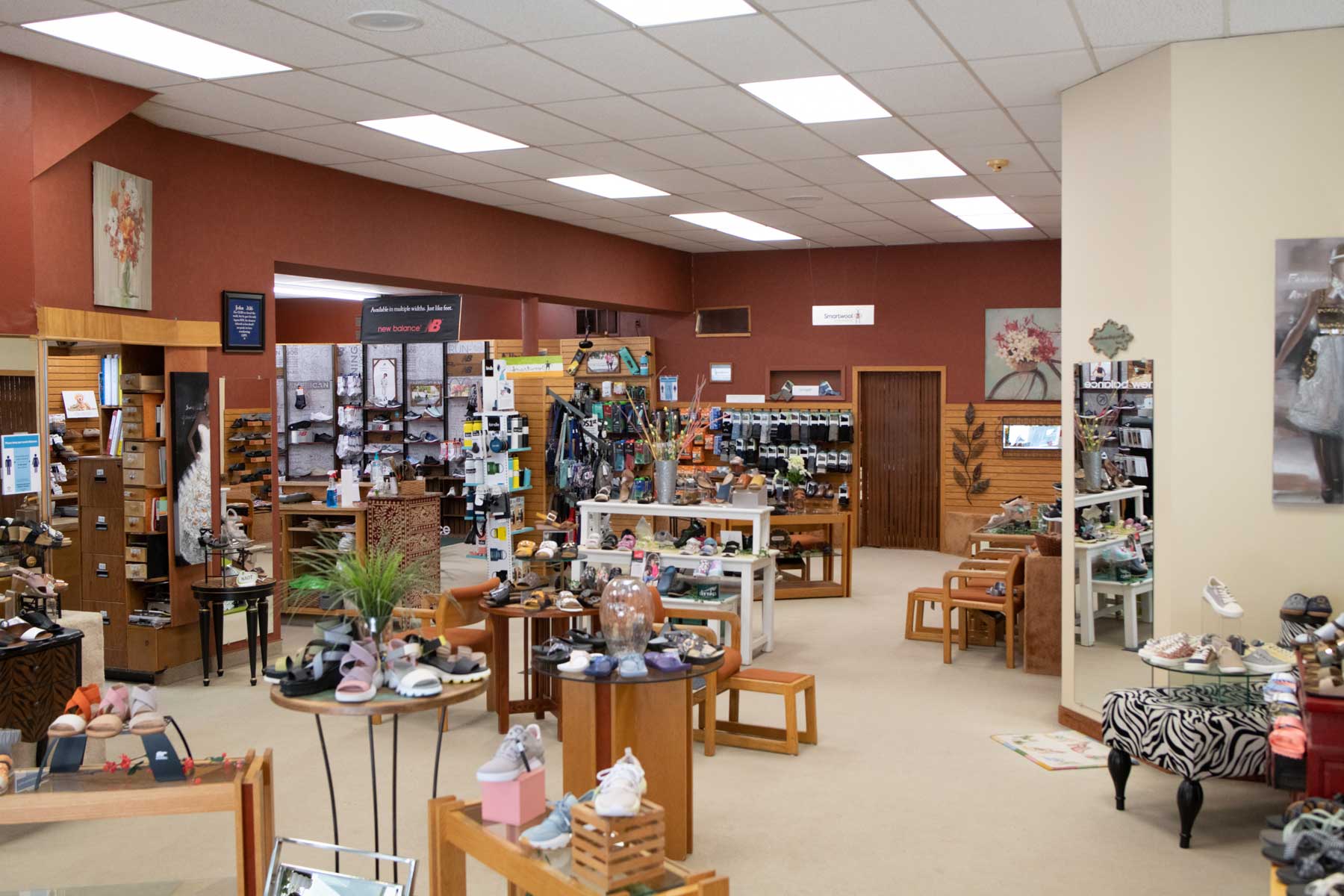 The interior of a shoe store with multiple displays